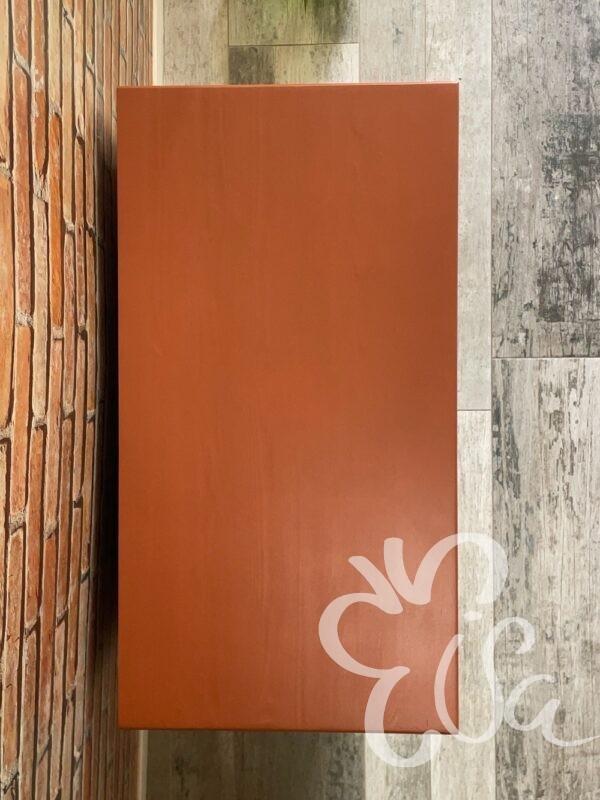 Commode 4 tiroirs terracotta pieds fuseaux vue de dessus