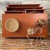 Commode 4 tiroirs terracotta pieds fuseaux vue du dessus